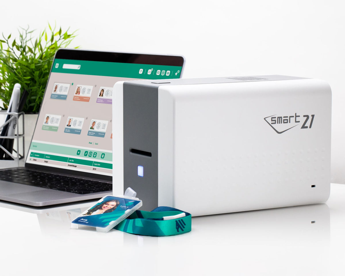 IDP SMART-21S ID Card Printer — example desktop setup; laptop and accessories not included