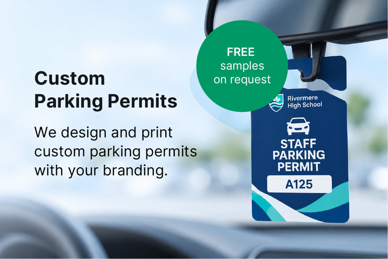 Custom staff parking permit hanging from a car rear-view mirror